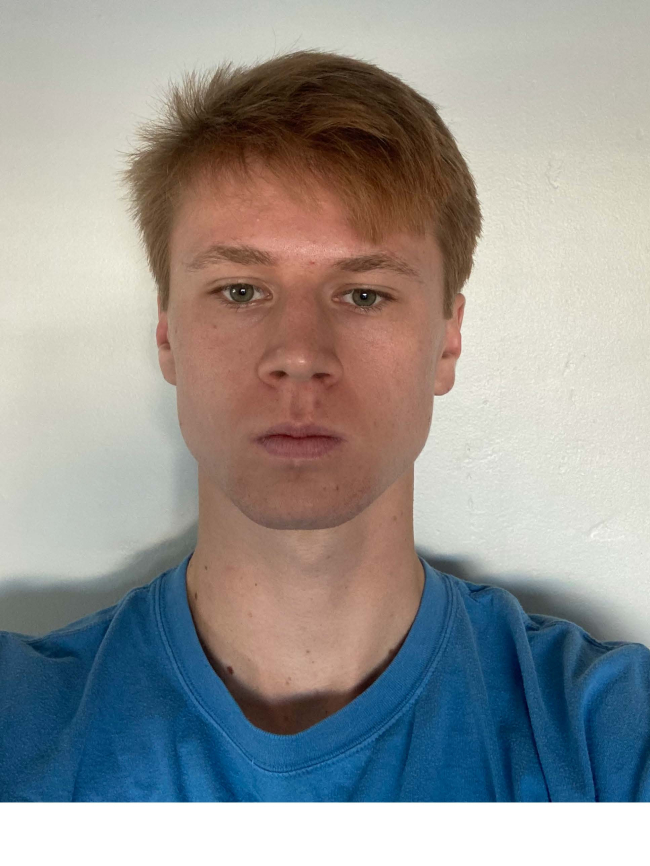 Headshot of William Rhys