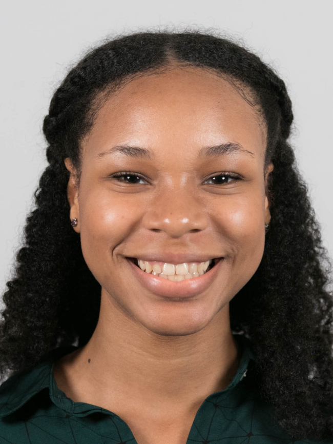 A headshot of Alanna Combs.