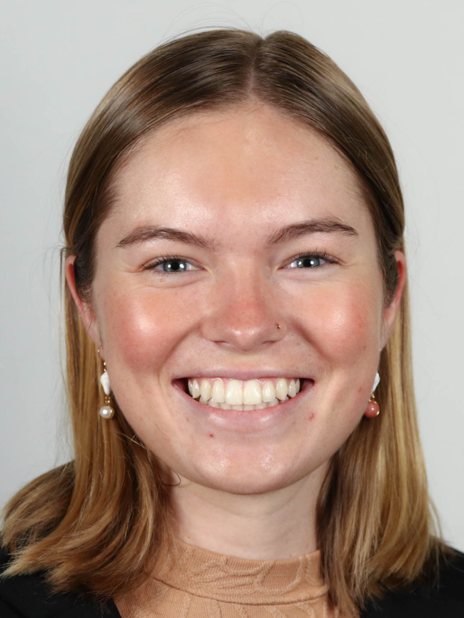 A headshot of Alexis Hadinger.