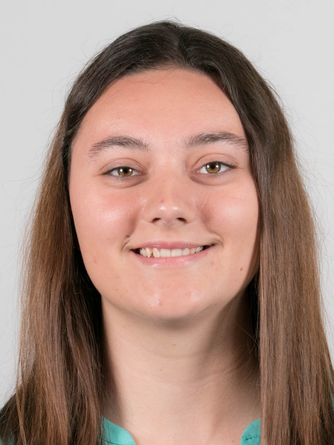 A headshot of Caitlyn Scott.