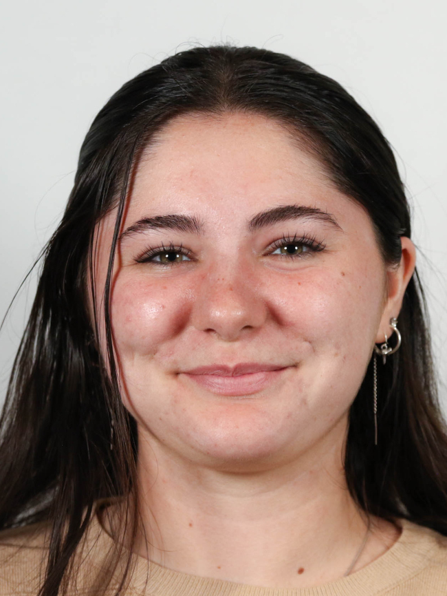 A headshot of Elizabeth Oliver.