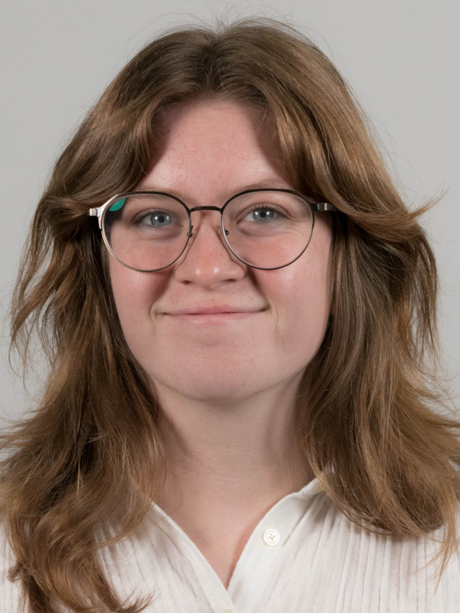 A headshot of Esther Adelson