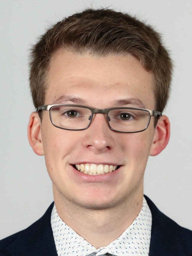 A headshot of Kyle Eskew.