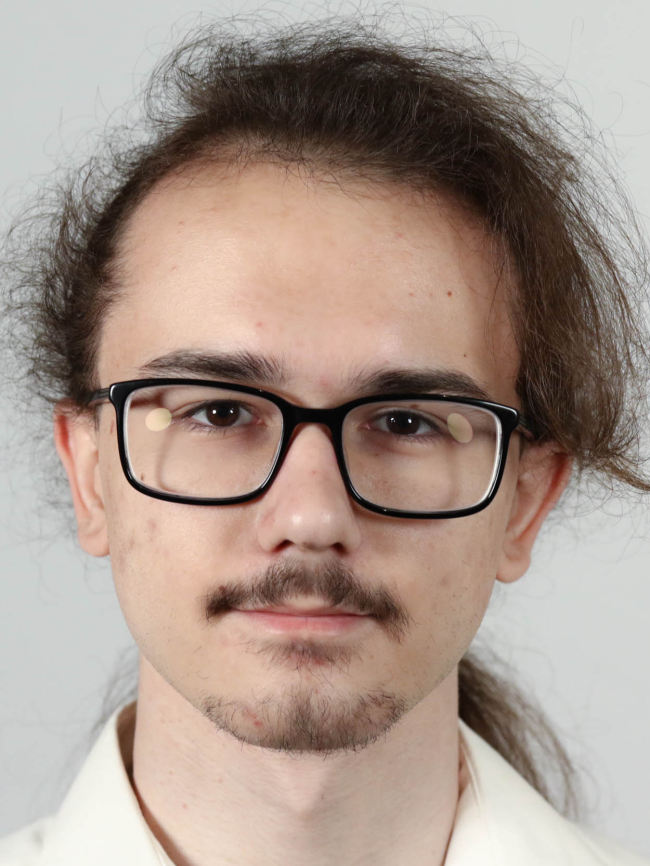 A headshot of Reid Griffin.