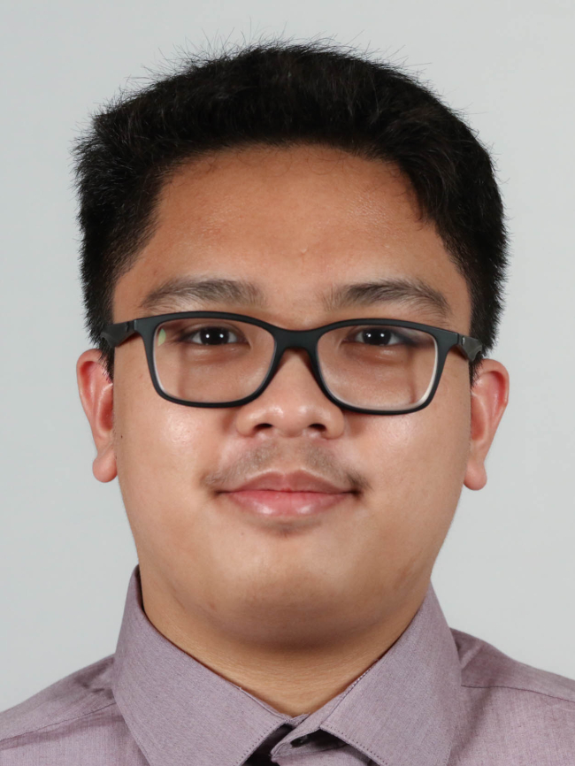 A headshot of Roy Patrick Galang.