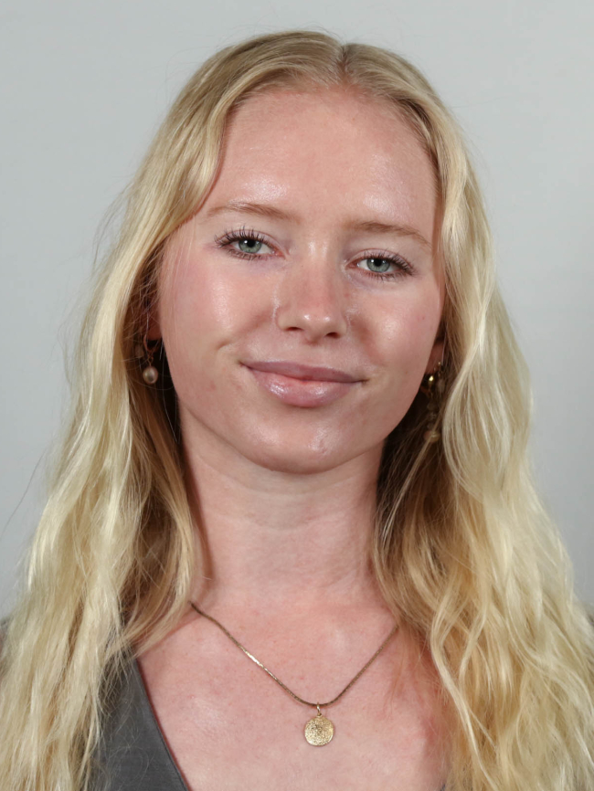 A headshot of Sydney Paull.