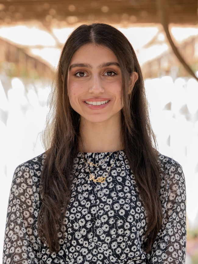 A headshot of Danya Awshah.