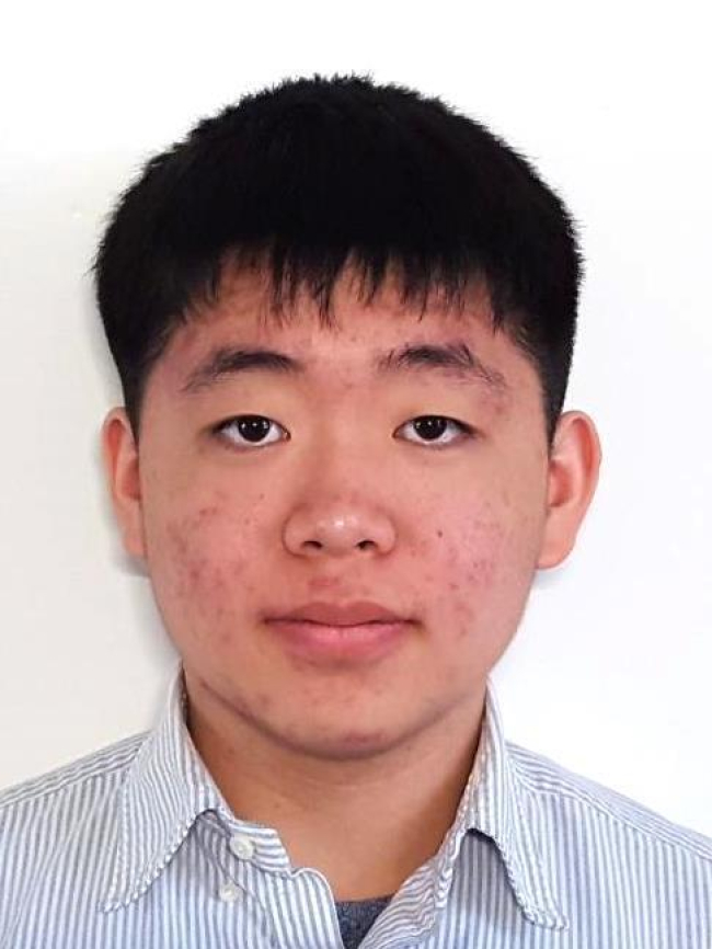 A headshot of David Ban.