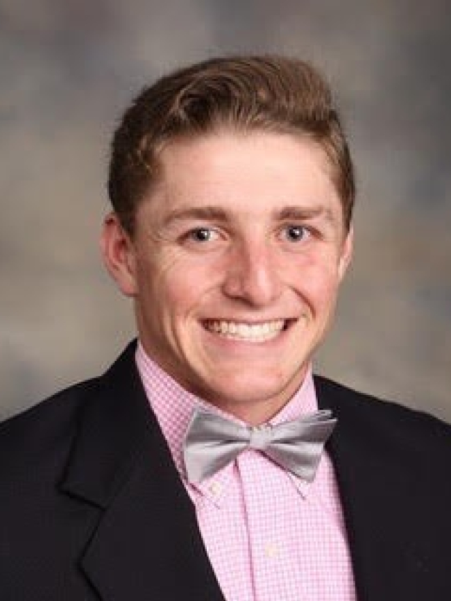 A headshot of Mathew Birtman.