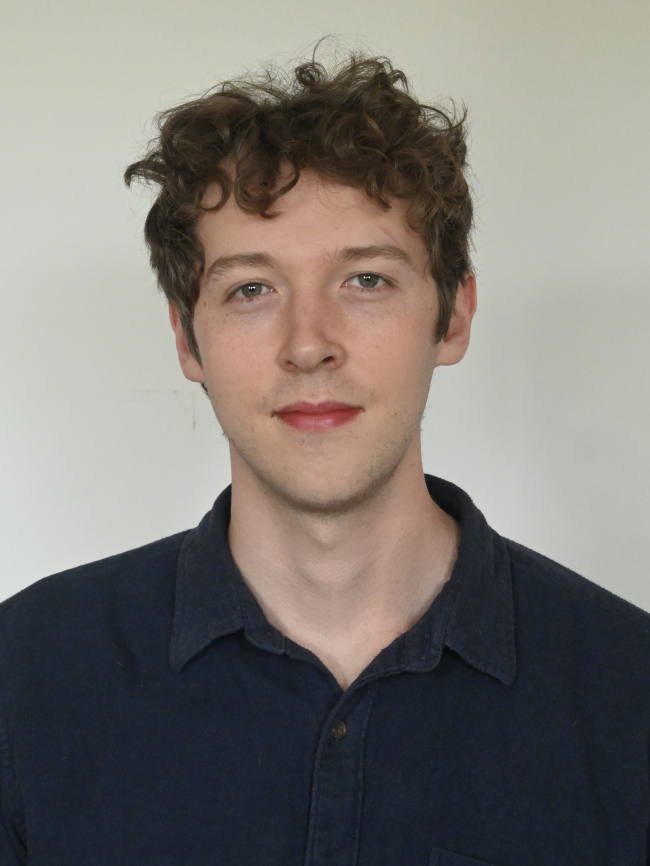 A headshot of Immanuel Bissell.