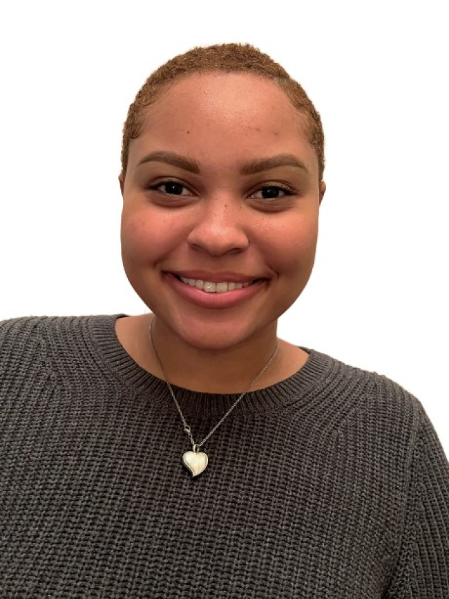 A headshot of Courtney Deloatch-Hill.