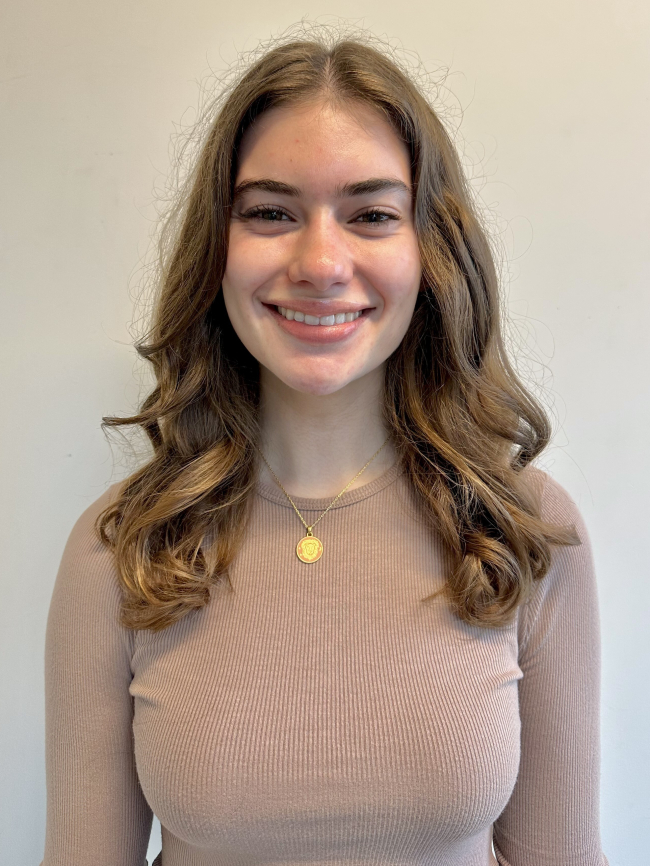 A headshot of Tatum Delaney.