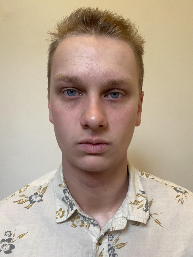 A headshot of Dylan Girone.