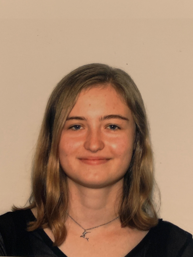 A headshot of Molly Halla.