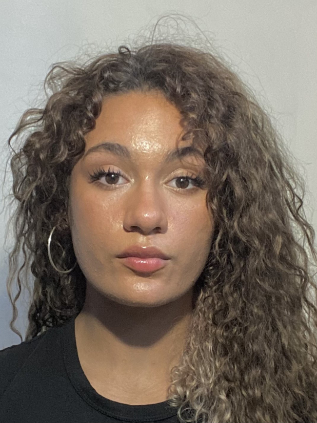 A headshot of Hannah Hunter.