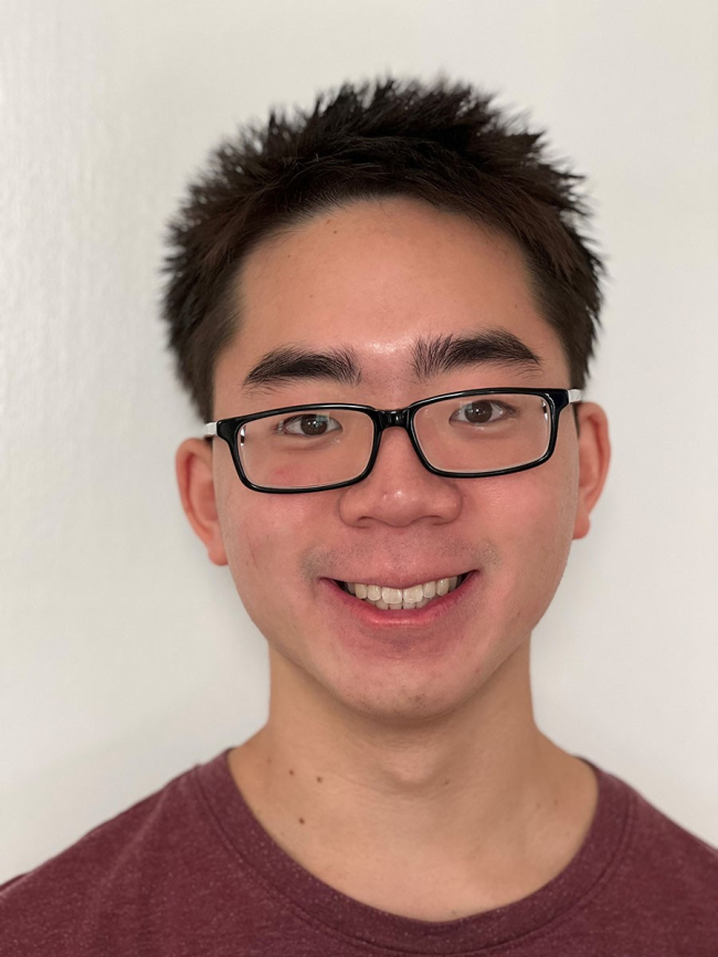 A headshot of Maxwell Katsouros.