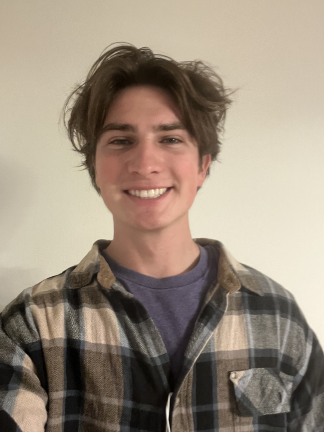 A headshot of Maxwell Lyons.