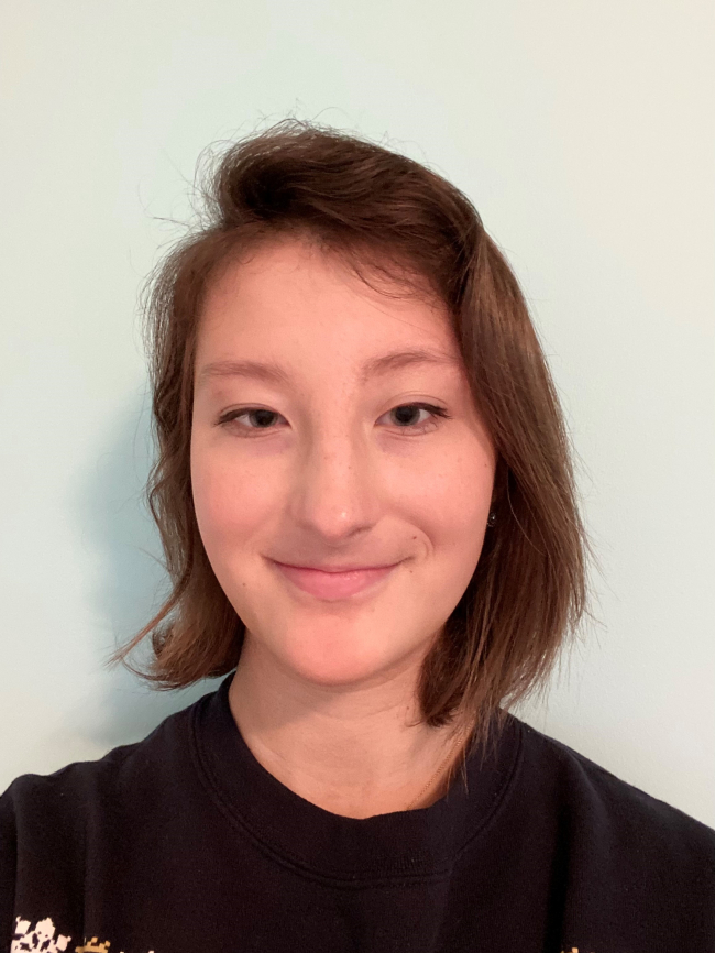 A headshot of Alexandra Redford.