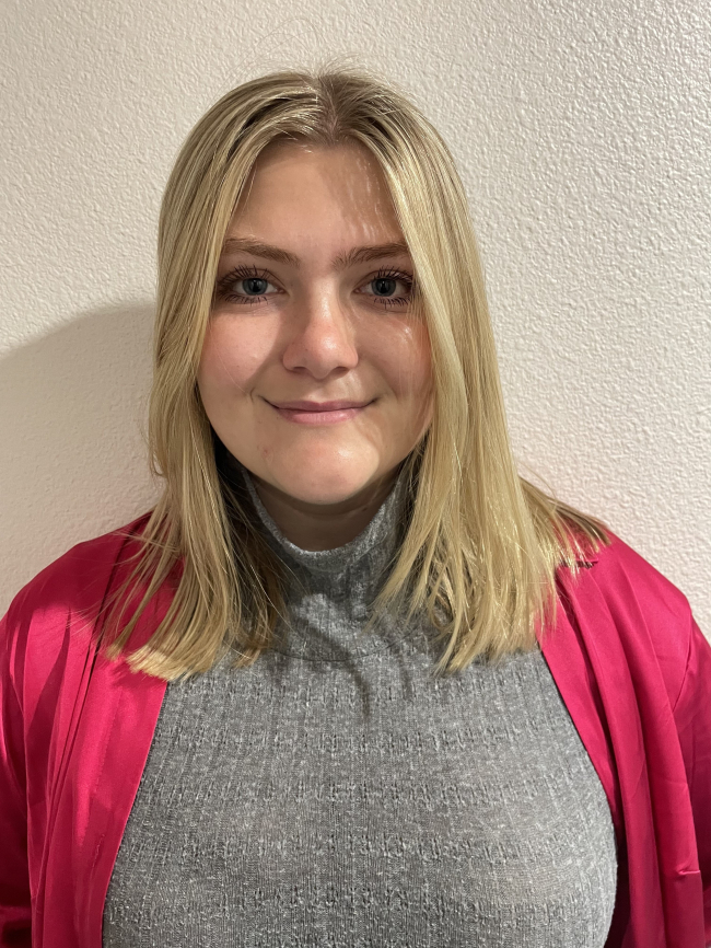 A headshot of Lacy Smith.