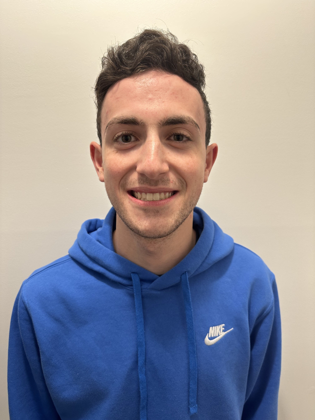 A headshot of Christian Spallone.