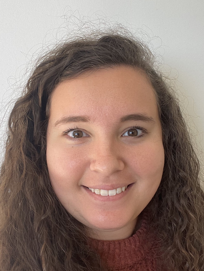 A headshot of Sydney Staines.