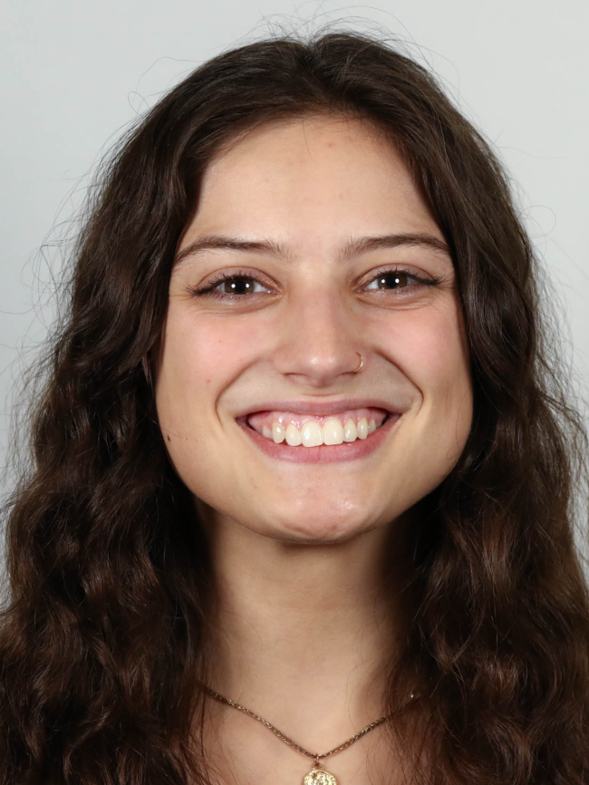 A headshot of Sydney Wray.