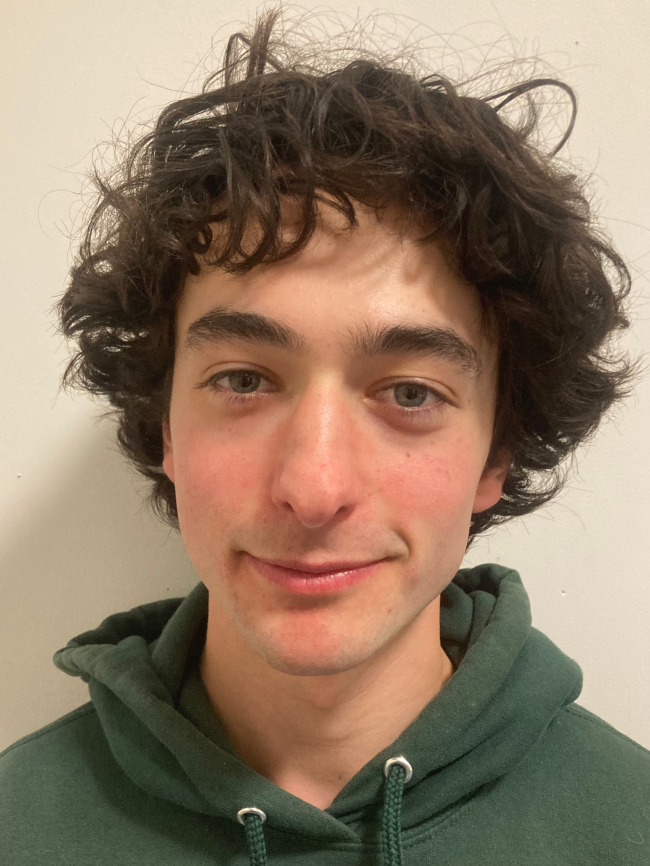 A headshot of Spencer Welsh.