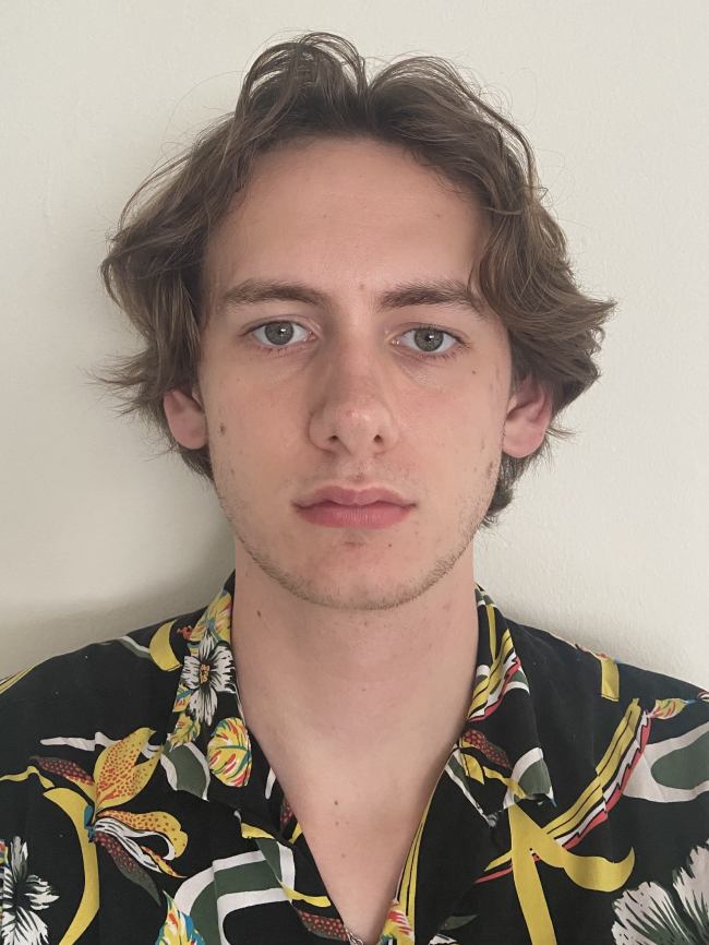 A headshot of Max White.