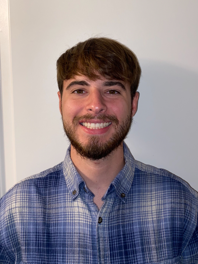 A headshot of Austin Willson.