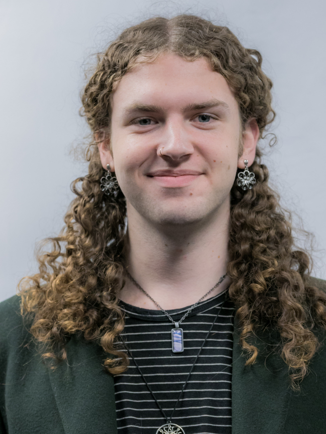 A headshot of Alec Duffy.