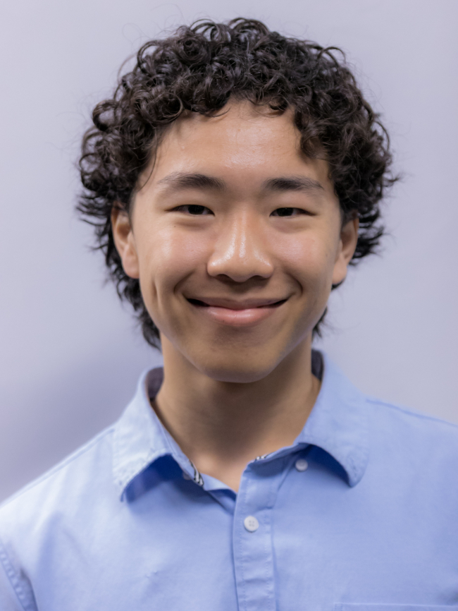 A headshot of Michael Han.