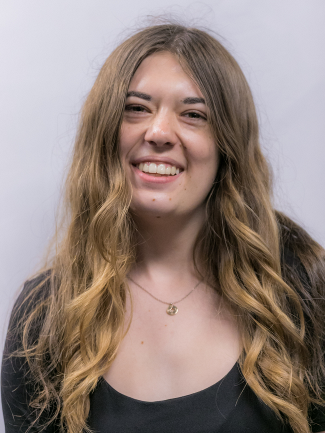 A headshot of Taylor Hart.