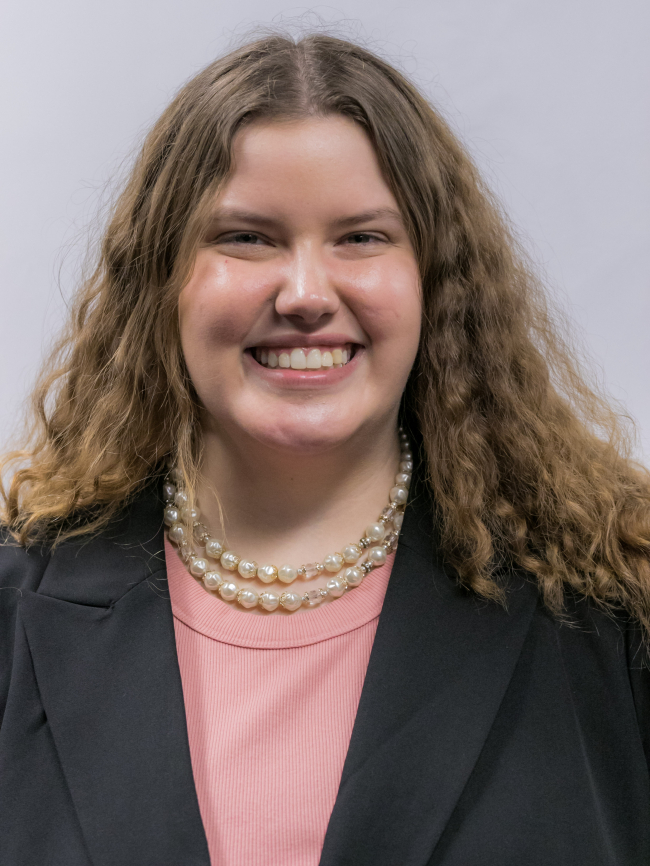 A headshot of Jordan Howell.