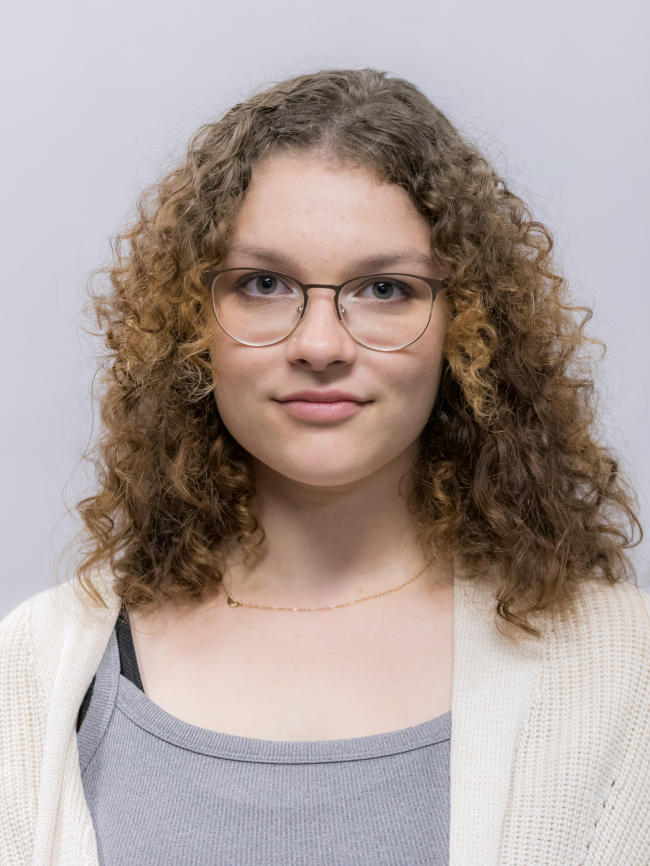 A headshot of Ryenne Julian.