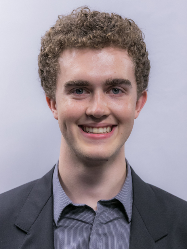 A headshot of Elliott Kirwan.