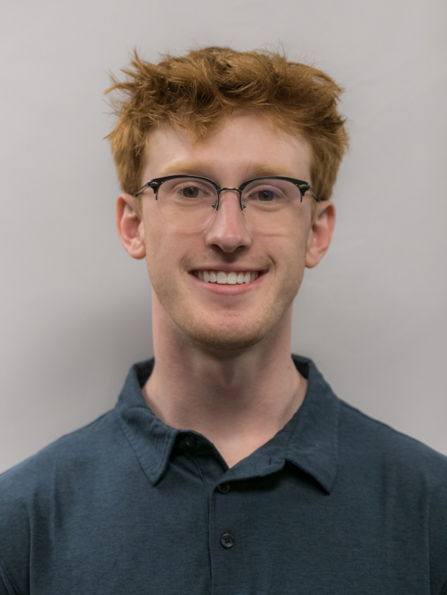 A headshot of Miles Lubas.