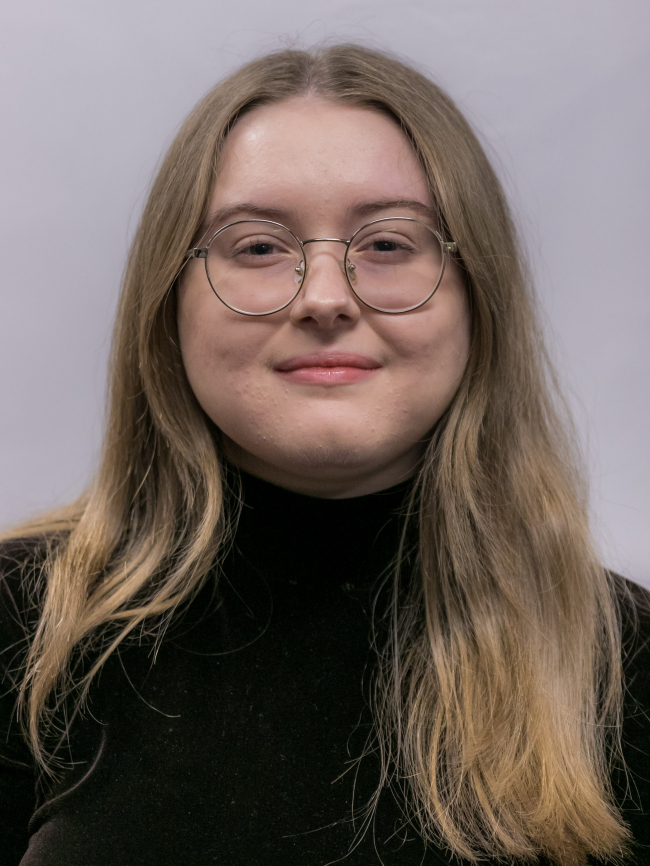 A headshot of Grace McCoy.