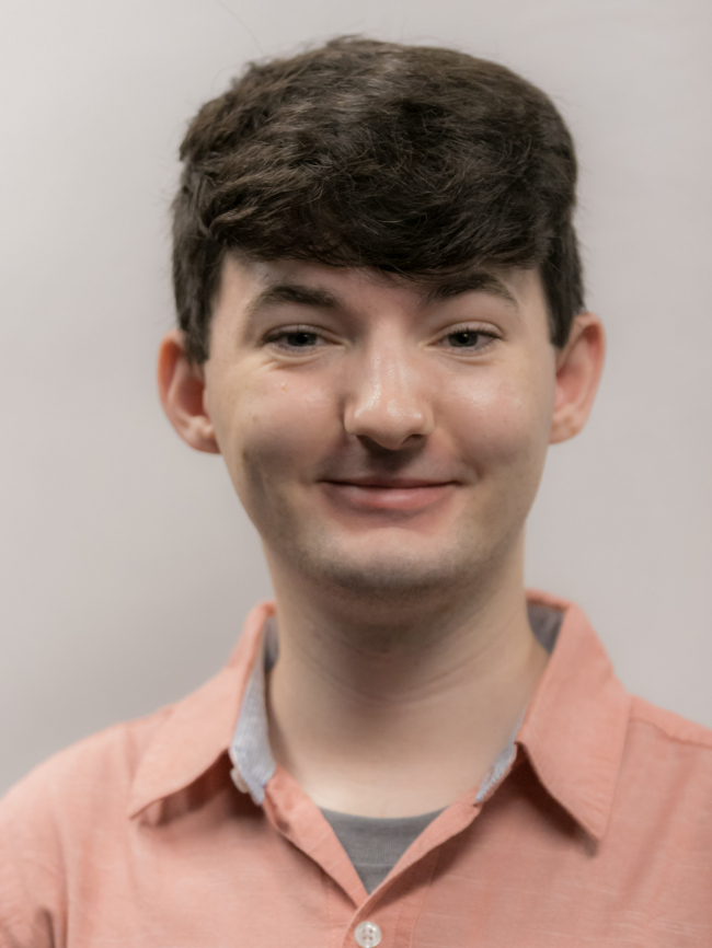 A headshot of Eliot Morrow.