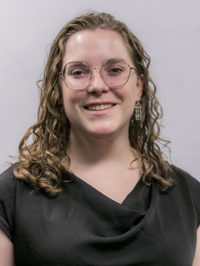 A headshot of Megan Neumann.