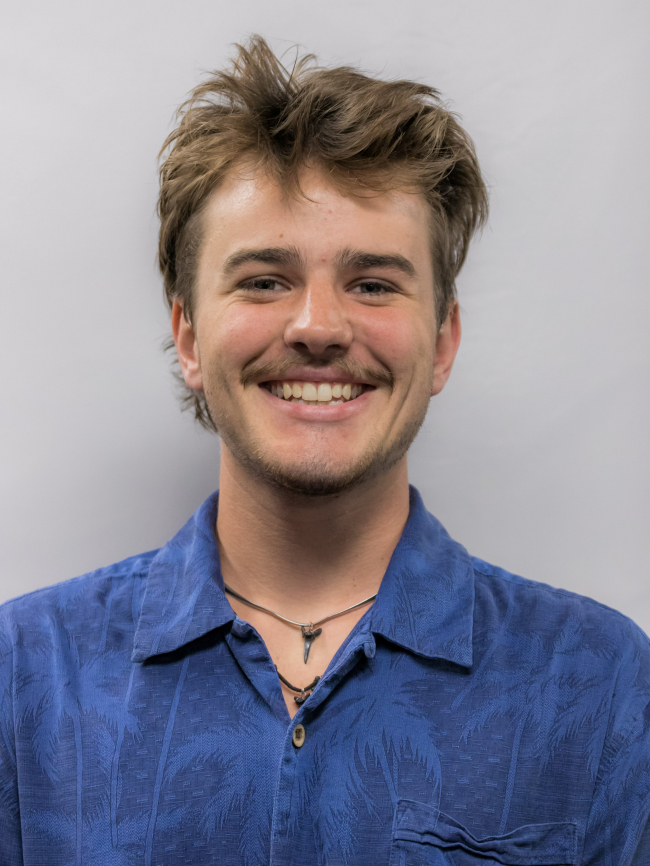 A headshot of Justin Osborne.