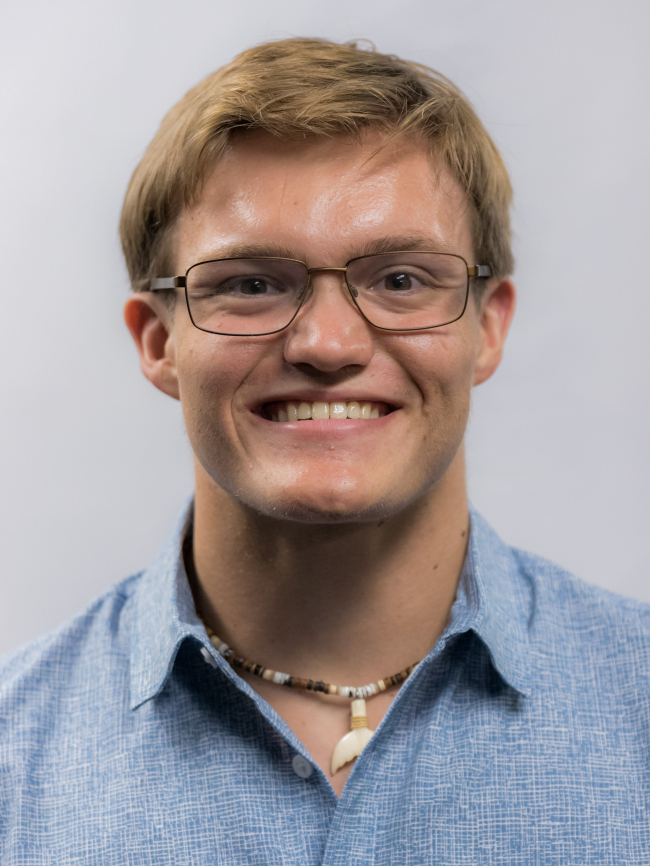 A headshot of Aidan Pflieger.