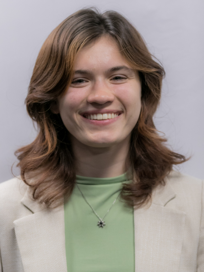 A headshot of Mikaela Serio.