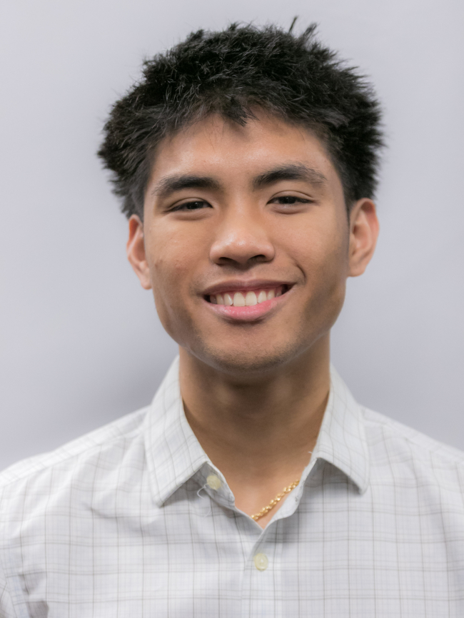 A headshot of Conner Timario.