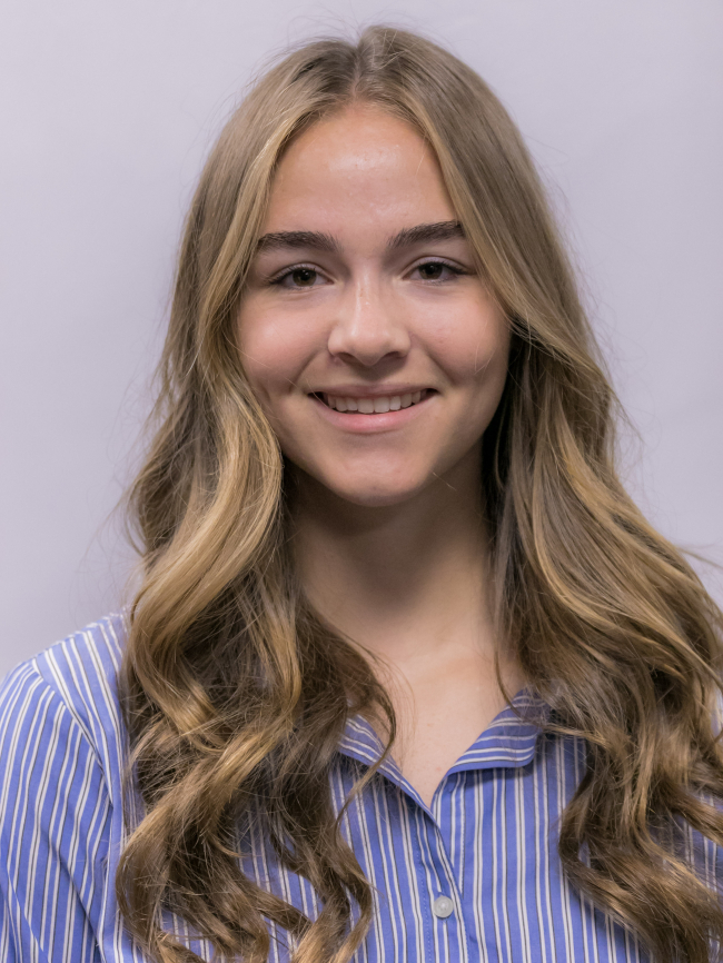 A headshot of Coral Tolman.