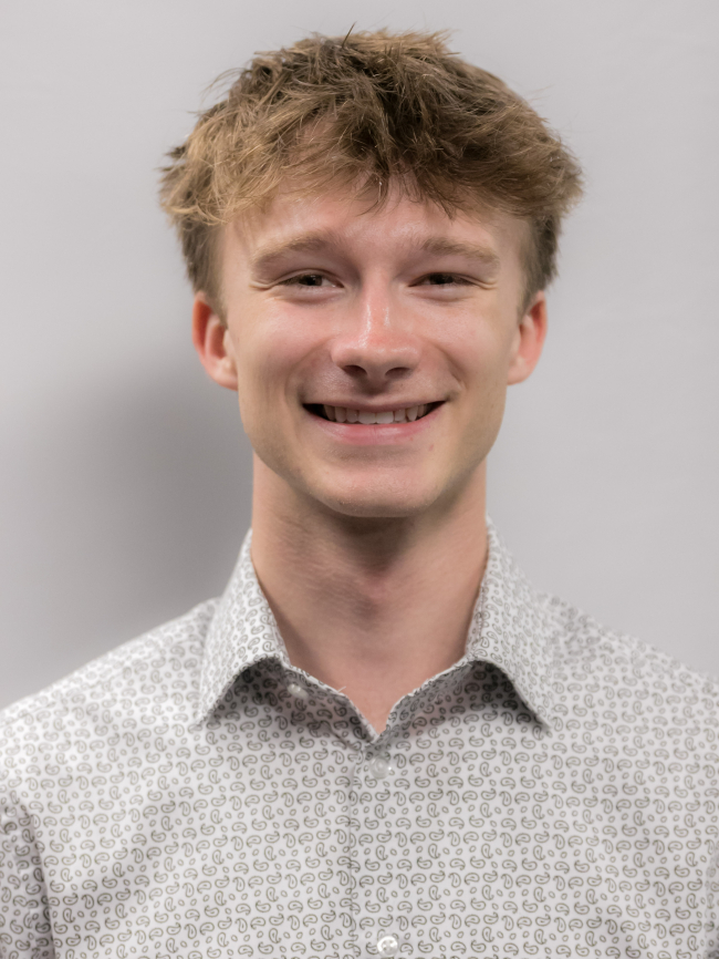 A headshot of Blake Yuenger.