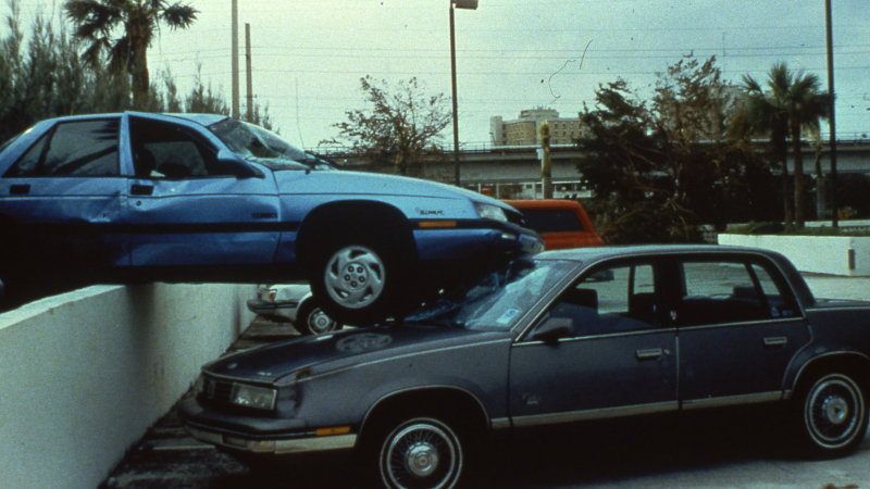 Automobiles tossed around like toys in the National Hurricane Center parking lot, Aug. 24, 1992