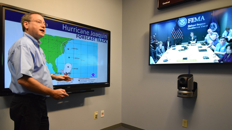 A forecaster with the National Hurricane Center in Miami briefs FEMA about the track forecast for Hurricane Joaquin in 2015.