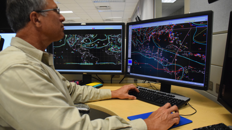 Dr. Chris Landsea, chief of the Tropical Analysis and Forecast Branch, prepares a forecast at NOAA's National Hurricane Center