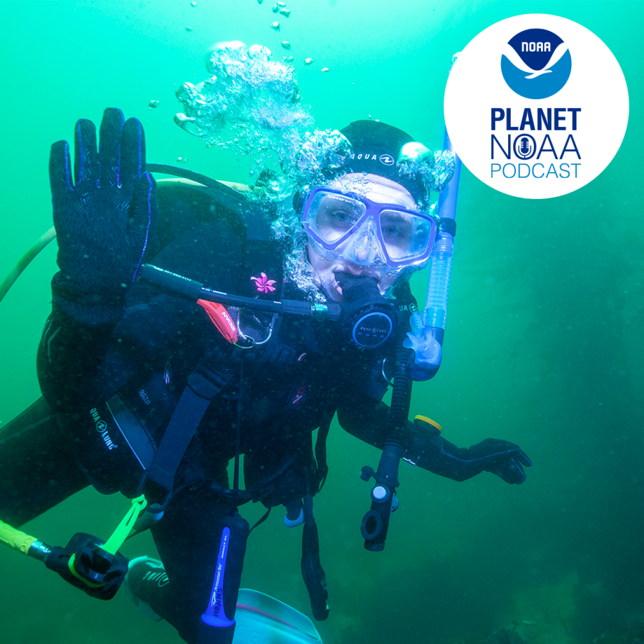 Hannah Brady, a 2018 NOAA Hollings scholar, waves to the camera after having finished taking pre-construction photos of the Monterey Bay Aquarium pipe for her summer internship. Credit: Chad King - NOAA/MBNMS.