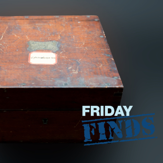 An early 20th century barocyclonometer. The dark wooden case is closed and bears a sticker with "cyclonometer" written on it.